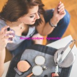 kaboompics.com_Closeup of a young woman applying perfume (2)